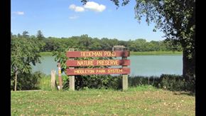 Middleton apartment for rent - a sign for the tilden pond nature preserve near a lake